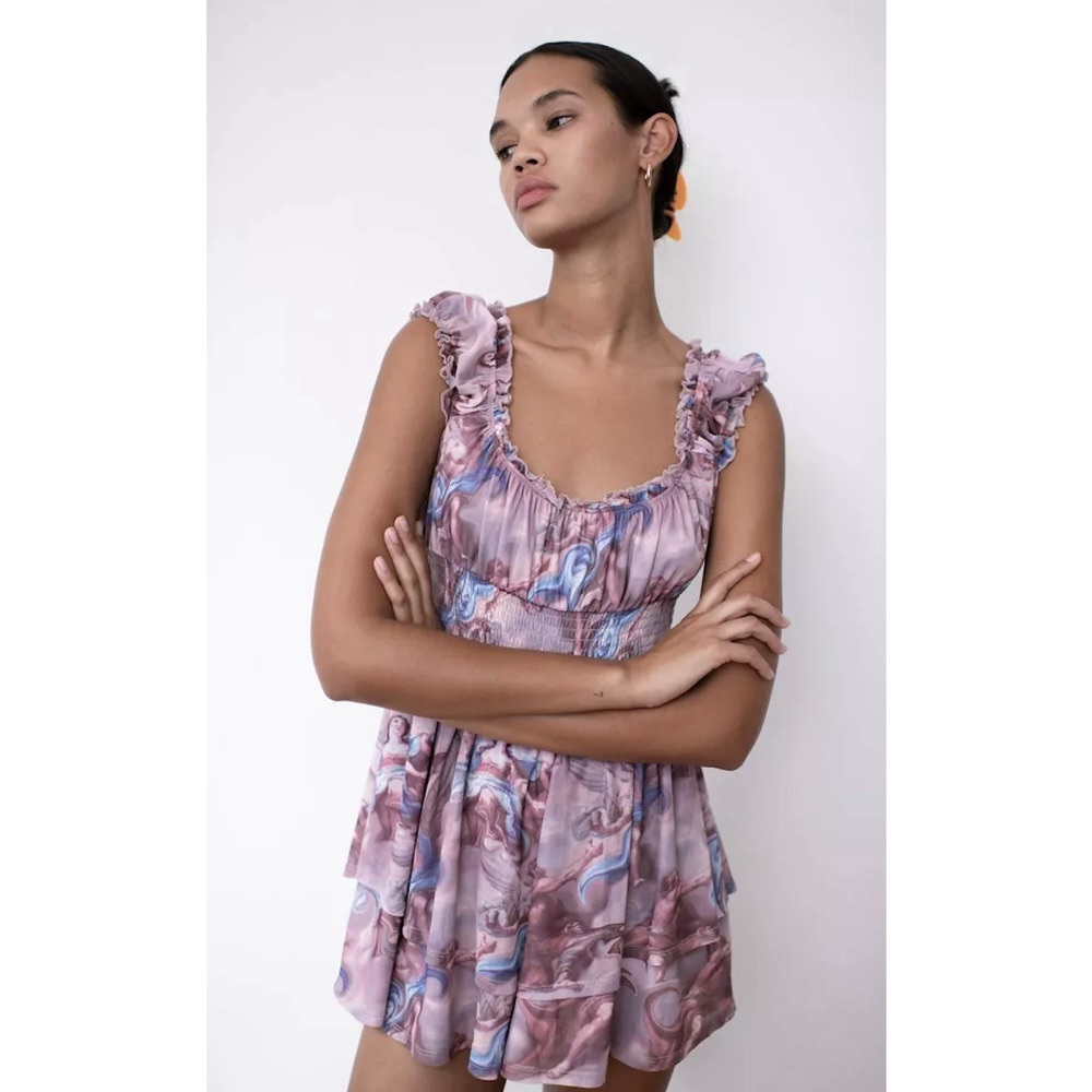 Urban Outfitters Rosie Mesh flowy romper in cherub angels print